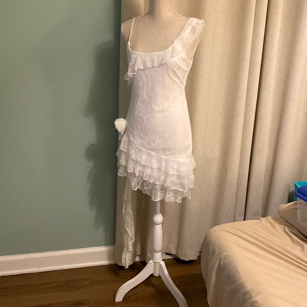 Never worn.  Beautiful lace dress.